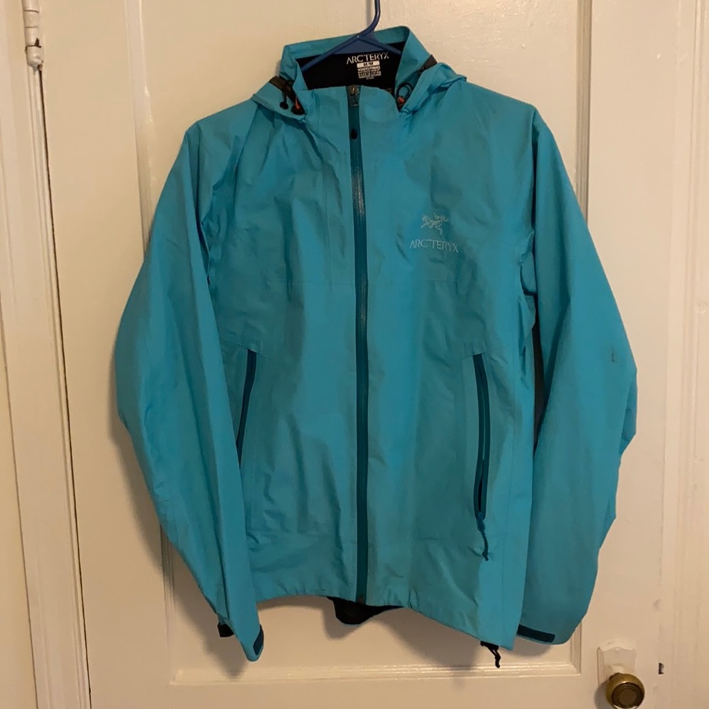 ARC’TERYX teal rain jacket